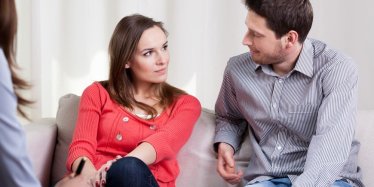 Young couple working through issues during a therapy session.