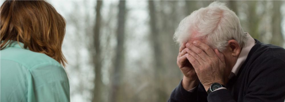 Gerontology Psychologist Discussing Genetics vs Environment With Elderly Patient