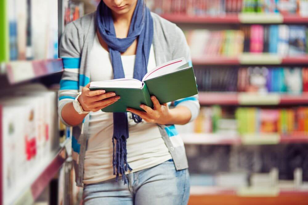 Puerto Rico Student in Library Studying For Her Psychology Masters