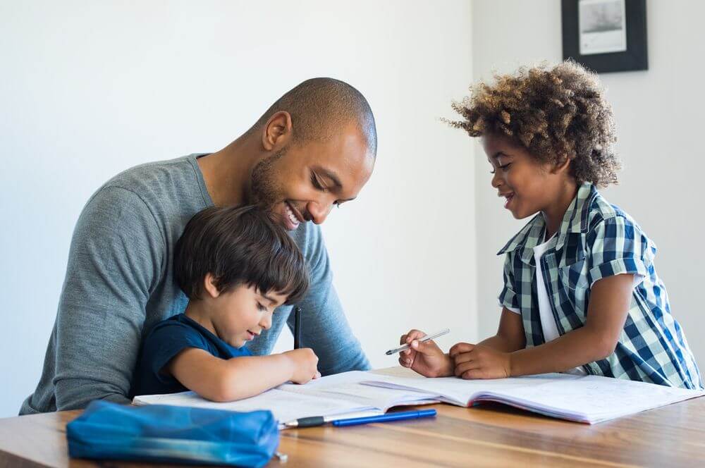 Illinois Father Studying With His Kids For Clinical Psychology Degree