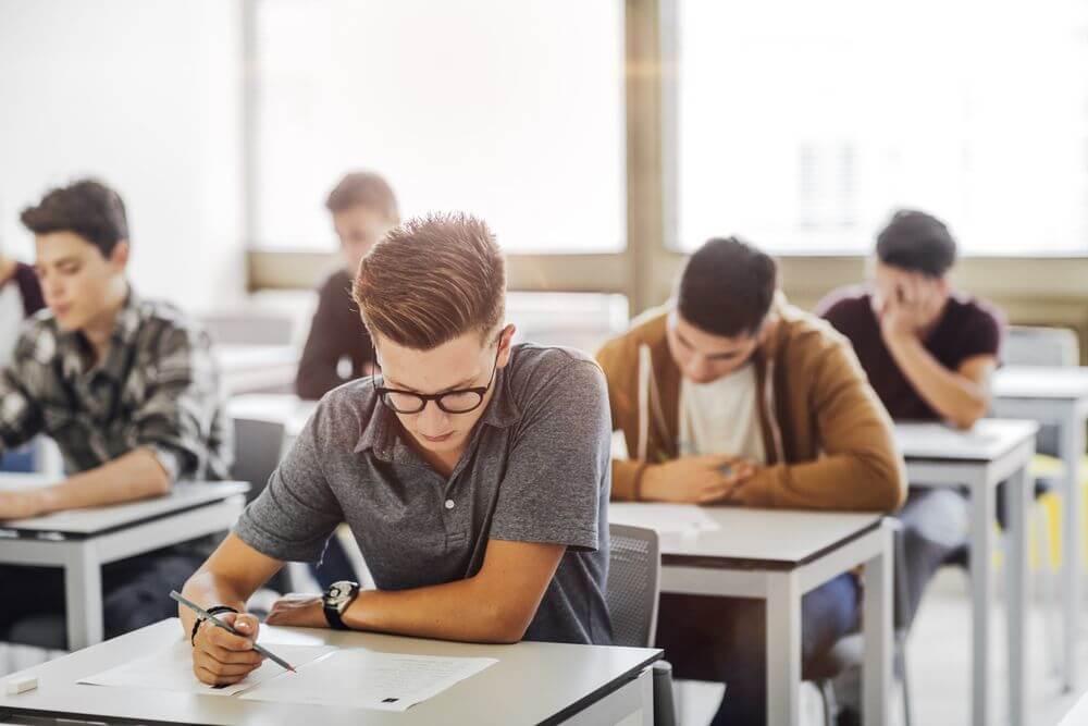 Vermont Students Taking a Test For Their Online Clinical Psychology Degree