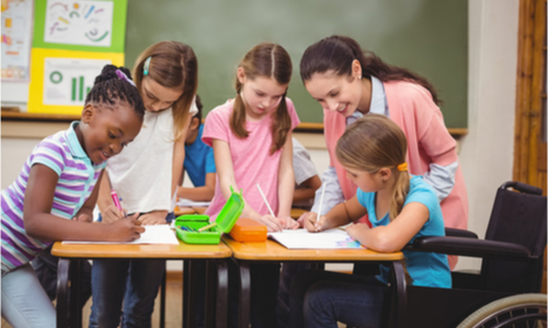 Teacher working with a group of young children